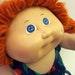 cabbage patch kid with red hair