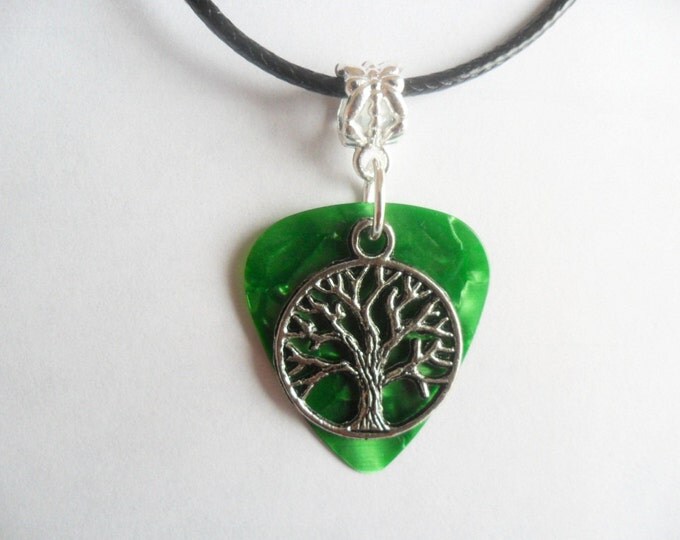 Green Guitar pick necklace with tree of life charm that is adjustable from 18" to 20"