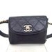 80s Vintage CHANEL navy waist purse with golden chain belt.