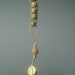 Adjustable Rosary Bracelet - Rosary bracelet made with natural leather cord and carved soapstone beads