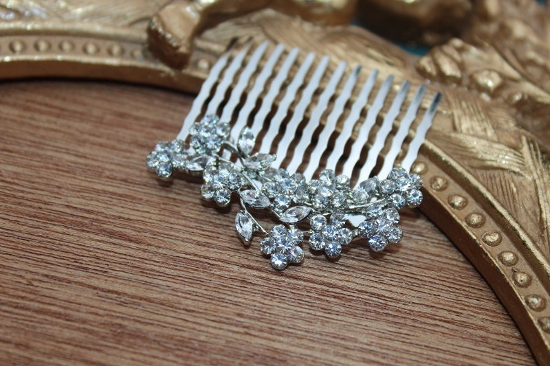Beautiful silver color hair comb with sparkling rhinestones