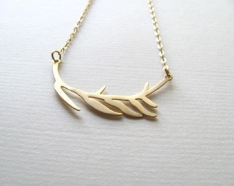 Delicate gold abstract branch pendant necklace on 14k gold plate chain