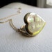 Vintage mother of pearl heart locket on long delicate 14k gold plated chain