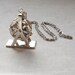 Shiny Silver & Gold Tone Ferris Wheel Eye Moveable Pendant Necklace