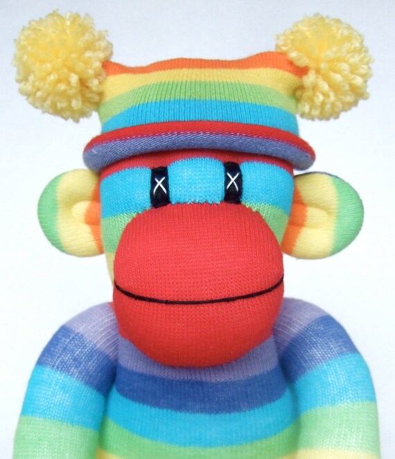Rainbow Sock Monkey with blue stripe behind eyes by Sunsetgirl