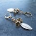 silver leaves and gold flowers earrings