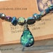 Strung-Out recycled guitar string choker with titanium pyrite and druzy pendant