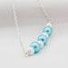 Baby Blue Pearl Glass Bead Necklace On Sterling Silver Wire, Attached To A Sterling Silver Chain