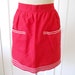 vintage 50s diner cotton half apron, bright tomato red with white rick rack trim, two pockets