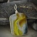 Dichroic Fused Glass Pendant - yellow, orange, and blue fused glass jewelry (by Meagan Chaney Gumpert)