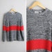 vintage UNISEX '80s black & white MARLED knit sweater with RED stripe. size men's m l / women's l xl 1x.