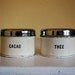 vintage Dutch canister set, thee (tea) and cacao, cream color with metal lids