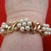 Vintage 7" gold bracelet with pearl stations in great condition, appears unworn