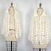R E S E R V E D 1970s Sweater Cloak - Vintage 70s Ivory Hand Knit Crochet Hippie Cape Cardigan - Walking Into Spiderwebs