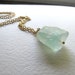 Raw flourite pendant necklace, light blue aquamarine mineral stone on long 14k gold plate chain