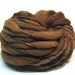 Handspun yarn in hand dyed thick and thin merino wool - 37 yards, 3.2 ounces/ 92 grams