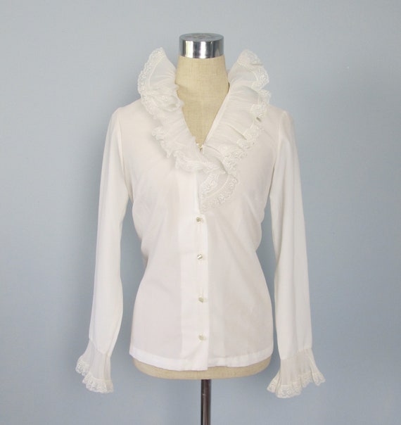 Vintage white blouse with ruffles flowers