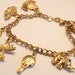 Vintage charm bracelet. Goldplated. Travel theme