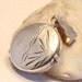 Vintage silver locket. Round. Patterned