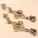 Amethyst and silver drop earrings. Celtic style