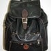 Studded Black leather backpack, with buckle