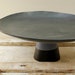 Big black cake stand with a touch of purple for a lovely dessert