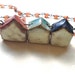 Three-house Necklace No. 1- stoneware, oxidized silver, and sunstone