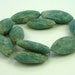Huge matte aquamarine enlongated nugget beads 43mm to 47mm