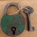 Very old large french metal padlock with handmade key