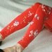 Red leggings with floral ornaments
