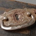 Vintage Art Nouveau style key hole escutcheon drawer pull handles.