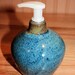 Blue pottery soap or lotion dispenser for kitchen or bath