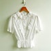 Vintage Romantic Victorian Lace Embroidery and Cut Out Puff Sleeves Elastic Peplum Top