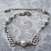 White Pearl Bracelet with Wings