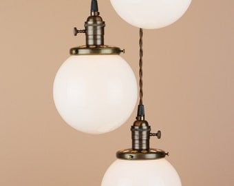 Chandelier Lighting - Cascading Pendant Lights - 6" White Milk Glass Globes - Antique Reproduction Wire - Oil Rubbed Bronze Finish