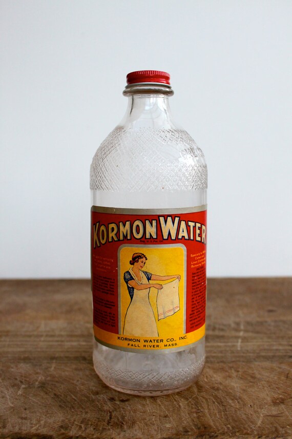 Vintage embossed Kormon bleach glass bottle by vintagewall on Etsy