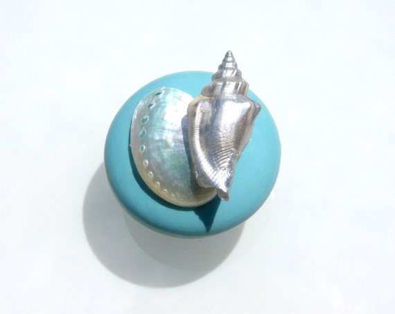 Cabinet Knobs in Cadillac Blue with silver seashells and abalone shell.