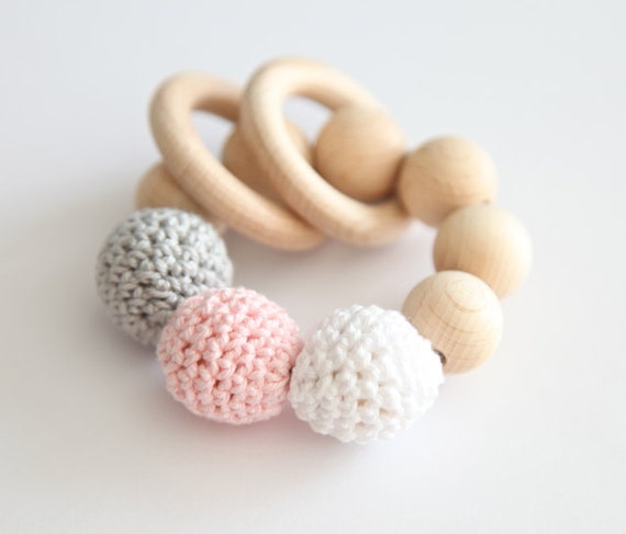 Teething toy, wooden rattle with crochet wooden beads and 2 wooden rings. Light grey, pale pink, white wooden beads rattle.