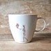 Skeleton Mug Heart In Hand
