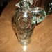 Large one handled green glass bottle...Superbowl Sale