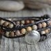 Earthy bohemian bracelet. Natural beaded leather bracelet. Double wrap earth tone bracelet.