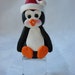 Personalized Penguin atop Ice Cube Polymer Clay Christmas Ornament Figurine. A handcrafted Art Sculpture.