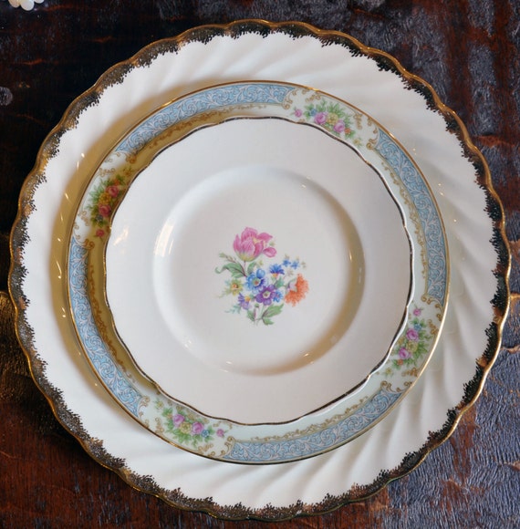 Items similar to Vintage Mismatched Plate Set with gold and floral