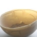 Stoneware porcelain bowl in ivory color