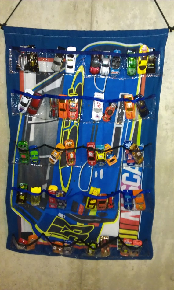 Items similar to Nascar Hot Wheels wall Organizer, Car Holder, Storage