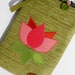 Wristlet or pouch that will hold your Kindle, or other eReader.