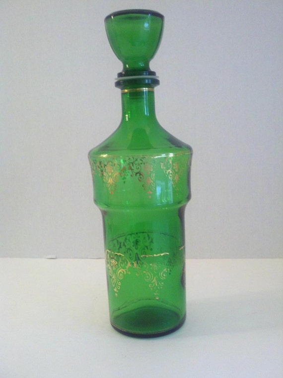 Vintage liquor bottle green with gold details.
