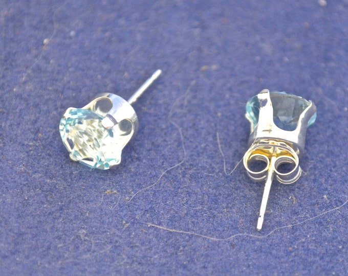 Topaz Studs, Sky Blue, 7mm Round Set in Sterling Silver E350