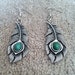 Green stone feather earrings
