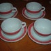 Pyrex set of four cups & saucers w red trim